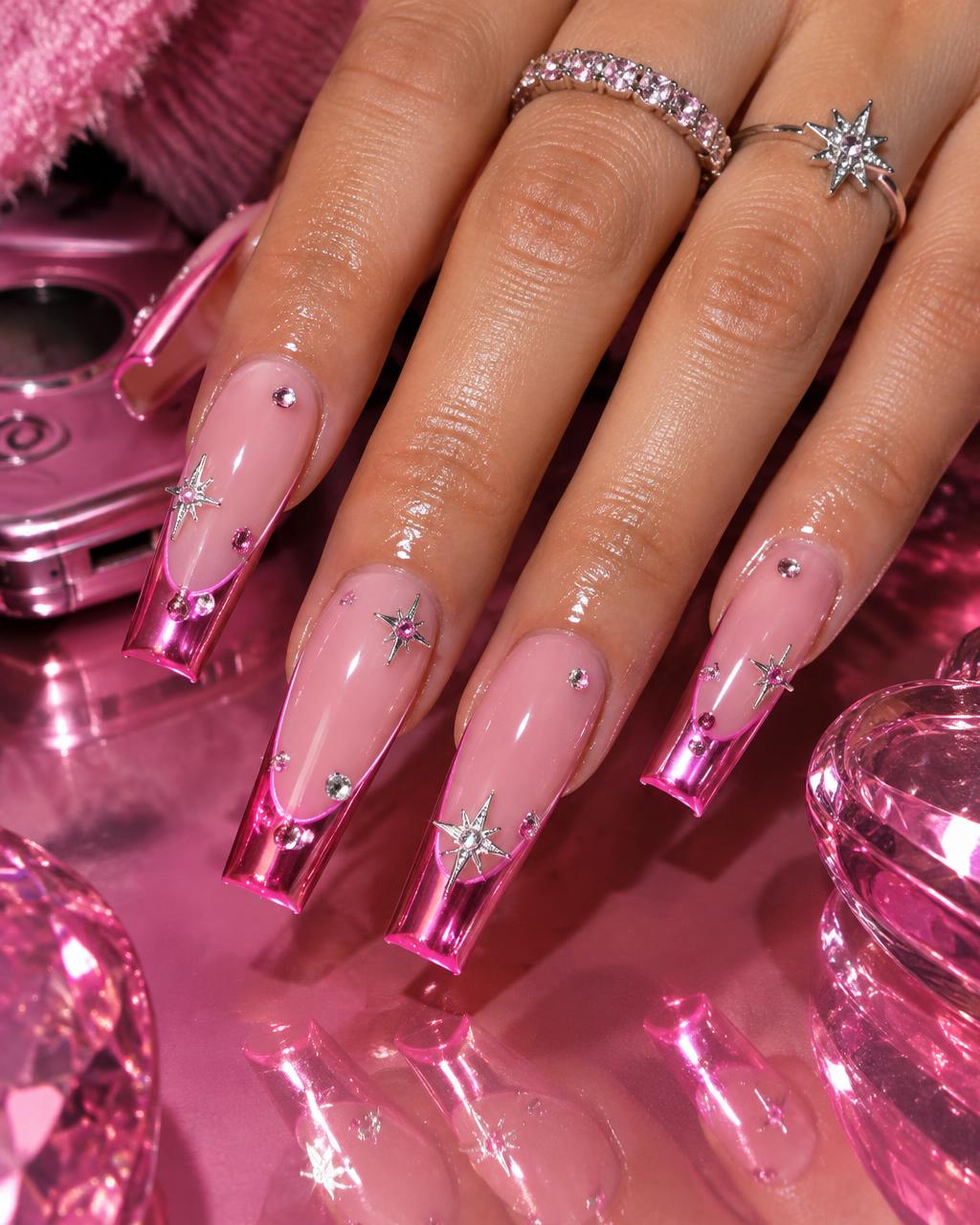 Pink chrome acrylic nails with crystal details